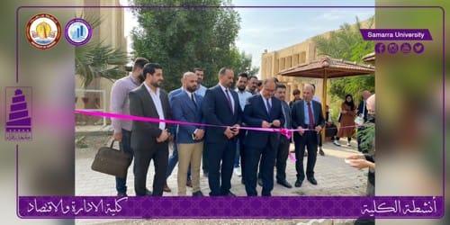 عميد كلية الادارة والاقتصاد يفتتح البازار الخيري